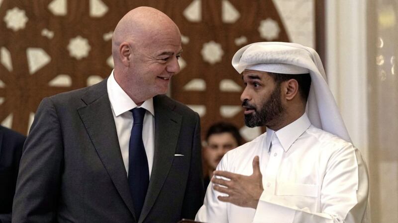 FIFA president Gianni Infantino (left) and Hassan Al Thawadi, the lead organiser of the 2022 World Cup, at a team seminar in Doha, Qatar last month.  
