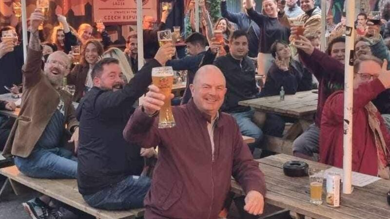Pedro Donald surrounded by customers at the Sunflower pub in Belfast, which he established in 2012 before selling up for a new life in Amsterdam. PICTURE: SUNFLOWER
