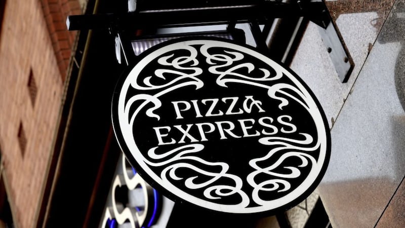 File photo dated 23/03/20 of a Pizza Express restaurant sign, the restaurant chain has said it could close around 67 of its UK restaurants, with up to 1,100 jobs at risk, as part of a major restructuring plan. PA Photo. Issue date: Tuesday August 4, 2020. See PA story CITY PizzaExpress. Photo credit should read: Tim Goode/PA Wire. 