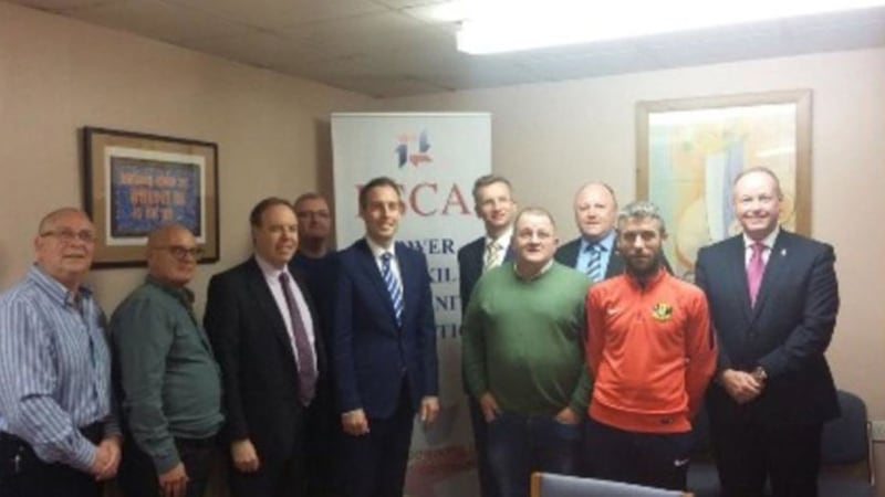 &nbsp;A tweeted picture of community workers including Denis Cunningham (far left) with a DUP delegation that included communities minister Paul Givan at the offices of the Lower Shankill Community Association