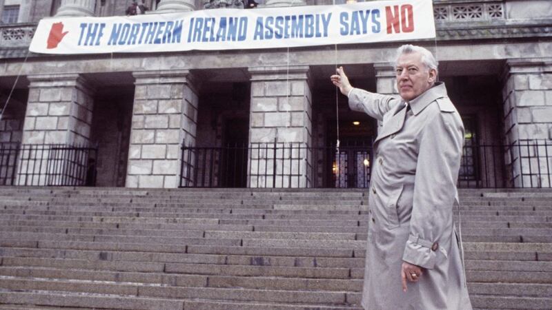 Rev Ian Paisley with an Ulster Says No banner outside Stormont in December 1985. Picture: Pacemaker Belfast. 