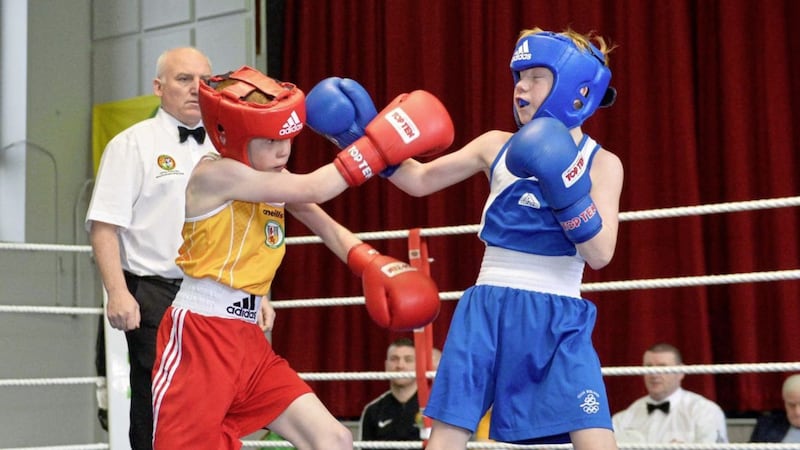 County Antrim&rsquo;s James Kelly (left) in action against Kildare&rsquo;s Nico Donoghue during their boy 2 31kg clash at Corpus Christi College on Saturday. The Holy Trinity fighter went on to get the nod from the judges on a split decision. Picture by Mark Marlow 
