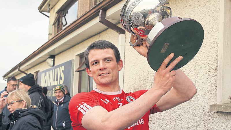 Aidan McCrory lifts the O Fiaich Cup after Tyrone&rsquo;s win over Louth at Oliver Plunkett Park <span class="Apple-tab-span" style="white-space: pre;">	</span>