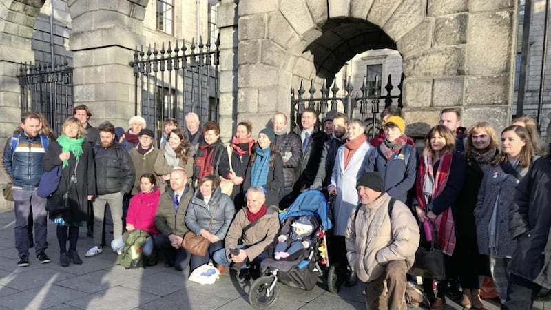 Supporters and members of Friends of the Irish Environment, outside the High Court in Dublin ahead of their landmark case against the State over its policies on tackling climate change. Picture by Cate McCurry, Press Association 