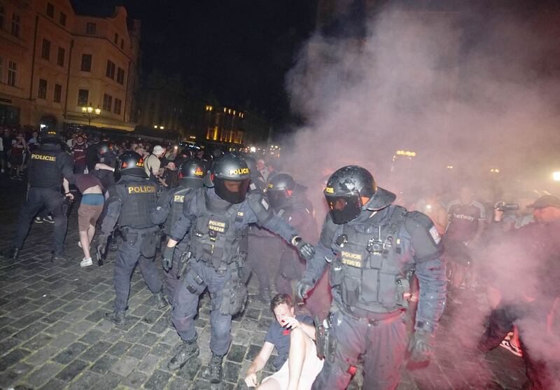 West Ham United fans and police in Staromestske Namesti, Prague. 