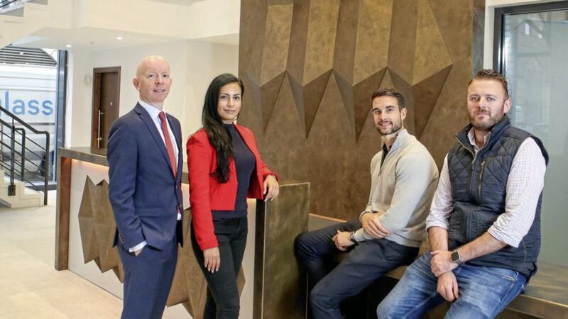 Inside the Adelaide Street scheme are (from left) David Wright, office agency director at CBRE; Kimia Benam of KB Architects; Will Mitchell, asset manager at M7 Real Estate; and Mark Louden, Portview. Photo: Darren Kidd/PressEye 
