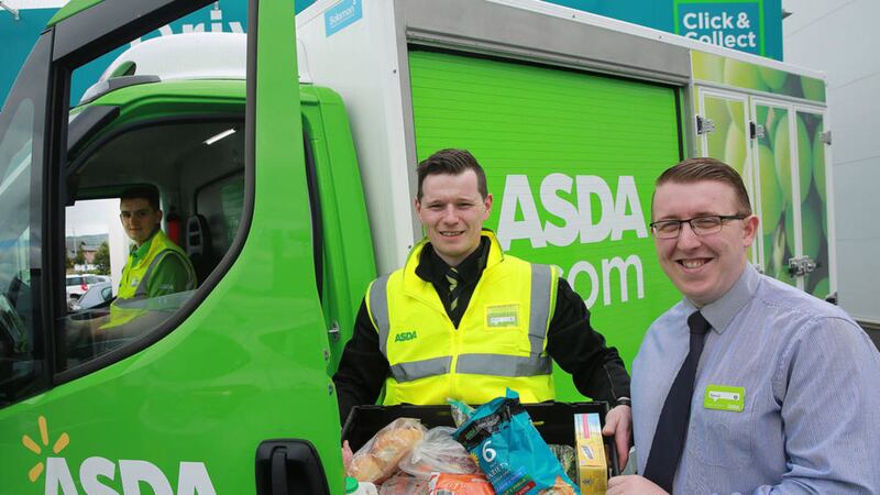 Samuel Watson, right, e-commerce manager and delivery driver William Coulter celebrate further investment in the chain&#39;s online offering     