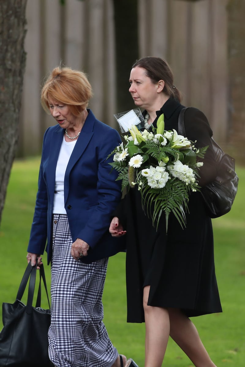 &nbsp;Unidentified mourners arriving for the funeral mass of Nora Quoirin at St Brigid's Church, Belfast.Liam McBurney/PA Wire