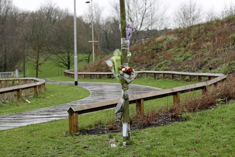 Flowers left at the scene of the murder of Christopher Meli at Glasvey Close, Belfast