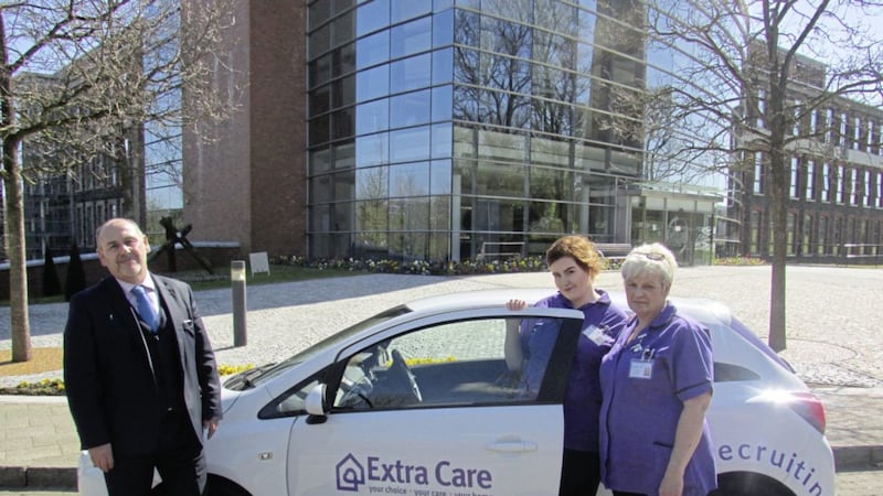 CEO of Extra Care, Brian Hutchinson with care workers, Sarah-Louise Connor and Iris Connor  