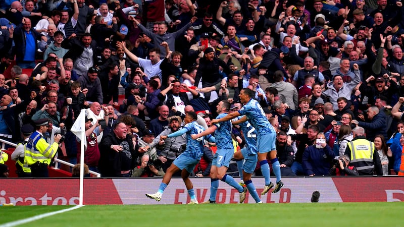 Arsenal suffered a setback in the Premier League title race with a 2-0 loss at home to Aston Villa