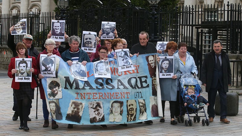 Relatives of those killed in the Ballymurphy massacre pictured outside court today. Picture by Hugh Russell