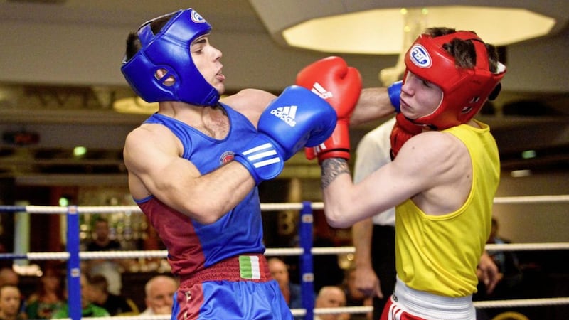 ANTRIM V EUROPE AT THE BALMORAL HOTEL. Pictured are Masseti Tiziano of Italy in action with Jo Jo McArdle of Ligoniel ABC at The Balmoral Hotel in Belfast.  Picture Mark Marlow 