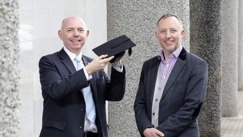 Professor Mark Durkin (left), executive dean at the Ulster University Business School, welcomes Niall McKeown as a Visiting Professor. Photo: Darren Kidd/Press Eye 