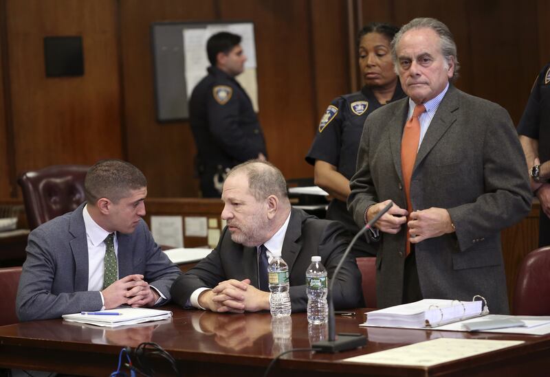 Harvey Weinstein, centre, and his lawyer Benjamin Brafman, right, make an appearance at New York Supreme Court