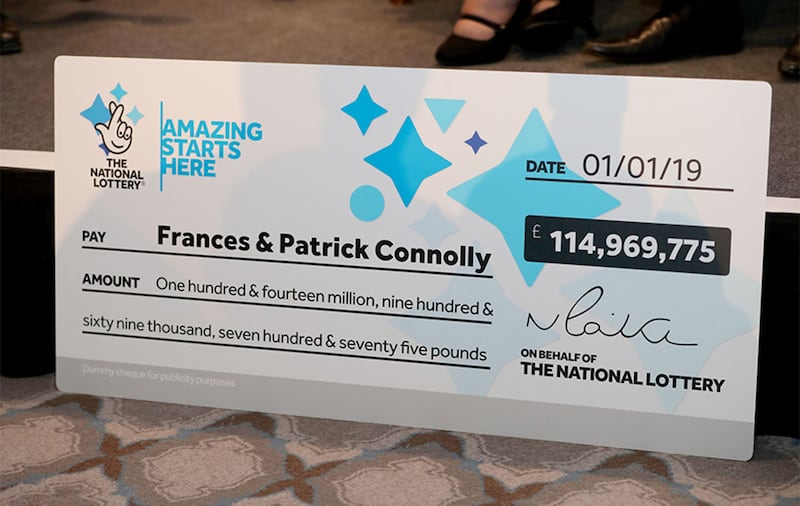 &nbsp;The winning cheque presented to the lucky couple. Picture by Liam McBurney/PA