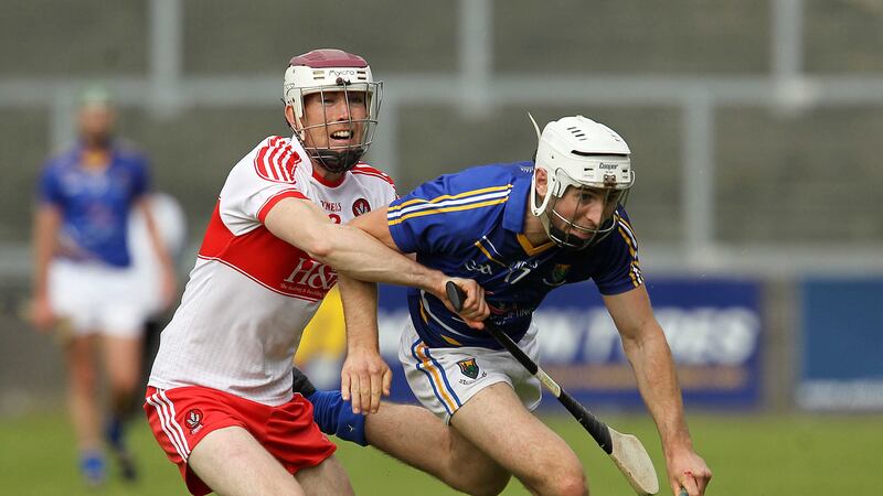 Derry's Darragh McCloskey and Wicklow's Diarmuid Masterson clash during Saturday's Christy Ring relegation play-off at P&aacute;irc Esler&nbsp;<br />Picture by Philip Walsh&nbsp;