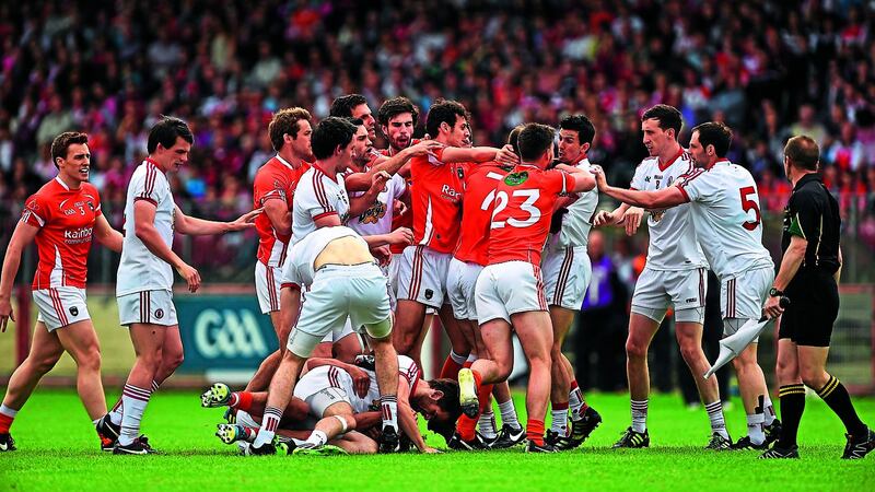 RED-HOT RIVALRY: An altercation between Armagh and Tyrone players breaks out in the opening minutes of the 2014 All-Ireland SFC Qualifier clash at Healy Park. Picture: Sportsfile