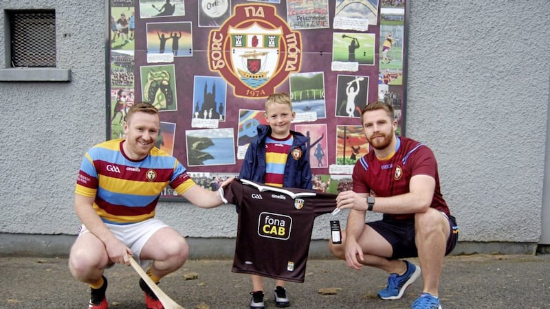 The senior hurling and football captains of west Belfast club Gort na M&oacute;na, Darron Boyd and Tommy McGoran, raised &pound;2,900 for the NI Hospice by doing a sponsored cycle around the Falls Park every day in May 