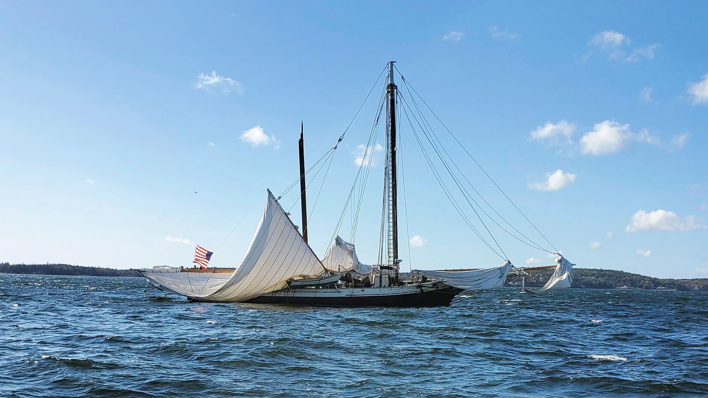 The historic schooner Grace Bailey with its main mast broken off the coast of Rockland, Maine (Kurt Schleicher via AP/PA)