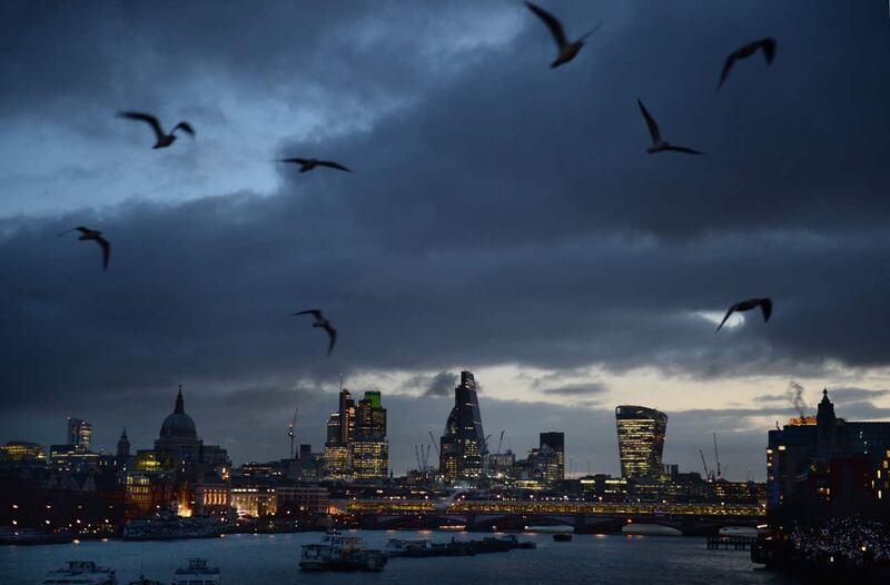Birds flying above Waterloo Bridge in London
