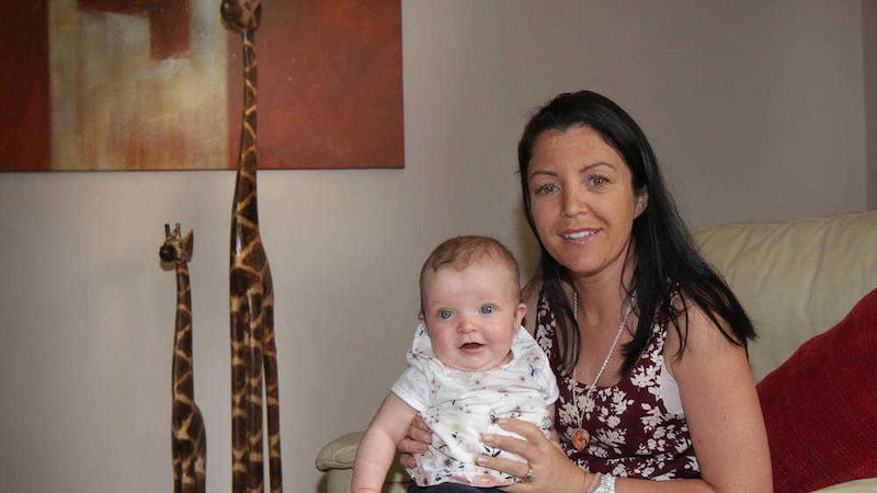 Baby R&iacute;oghnach McGrotty and her mum Louise at their home in Derry. Picture by Margaret McLaughlin 