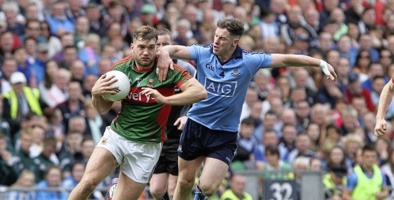 Philly McMahon battles with Mayo&#39;s Aidan O&#39;Shea. Picture Colm O&#39;Reilly 