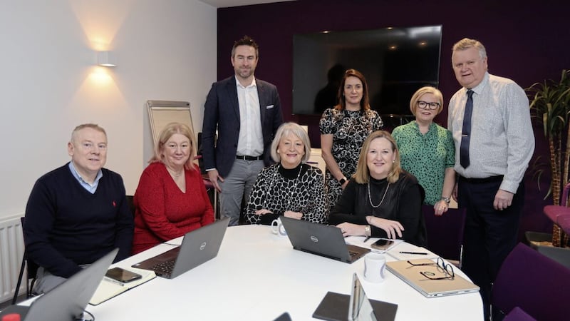 The panel of judges, chaired by Women in Business Group chief executive Roseann Kelly (seated right), deliberate over a record ahead ahead of choosing the finalists. Picture: Hugh Russell 