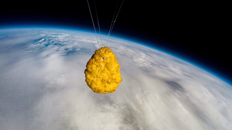 The breaded snack took just under two hours to reach 110,000ft (33,528m) above the Earth.