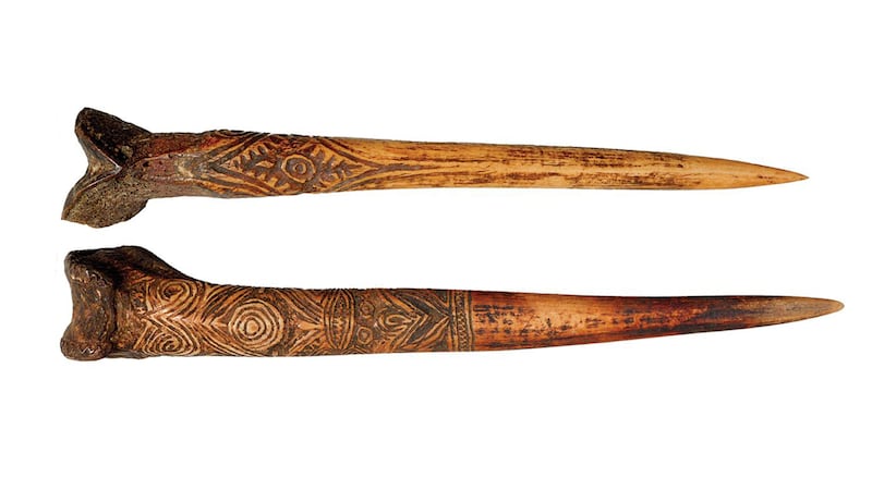 The carved femurs were seen as the weapon of social prestige.