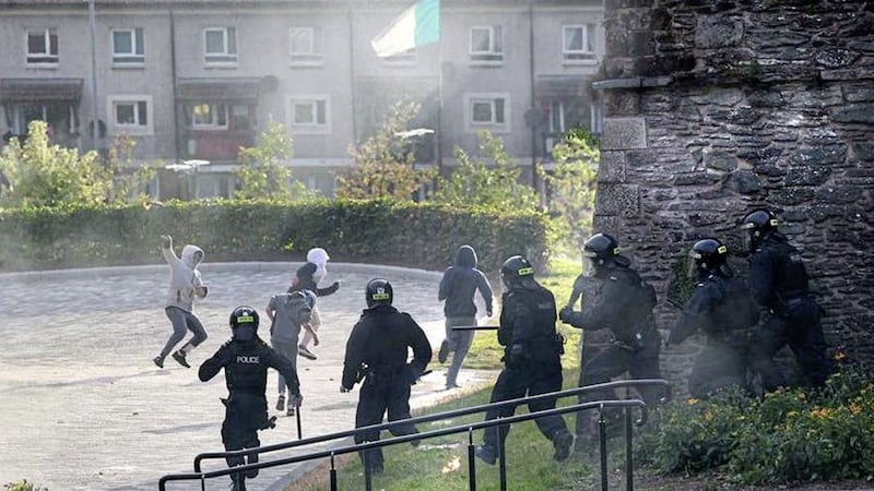 Police moved in as disorder erupted for a sixth night 