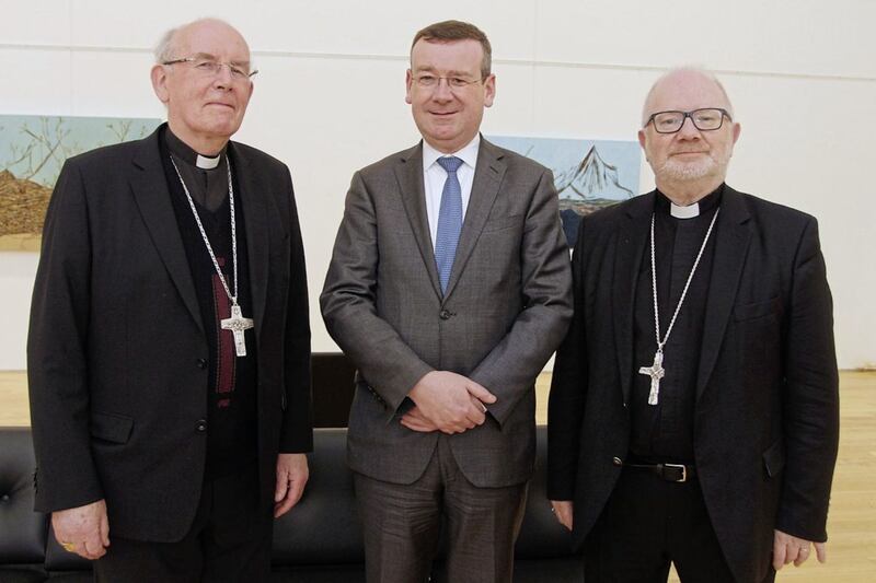 Francis Campbell with, pictured left, Cardinal Sean Brady and, pictured right, Church of Ireland Archbishop of Armagh Richard Clarke at a Cathedrals&#39; Partnership event in Armagh 