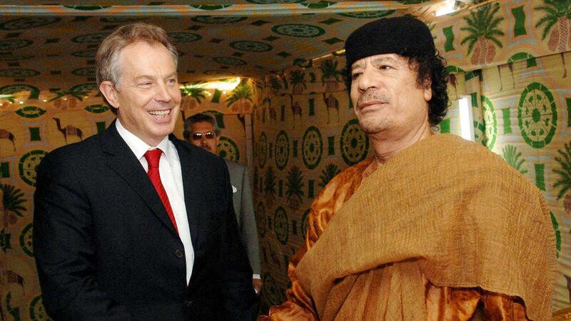 Former British Prime Minister Tony Blair meeting Colonel Muammar Gaddafi at his desert base outside Sirte south of Tripoli in 2007&nbsp;