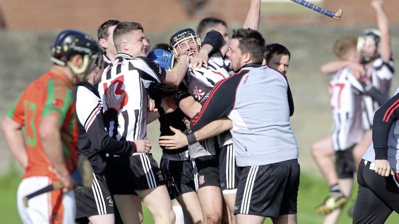 The Middletown players celebrate after Sunday&#39;s Ulster Club IHC final win over Lavey, landing the intermediate title in their first year back at the grade following their 2011 success. Picture by Cliff Donaldson. 