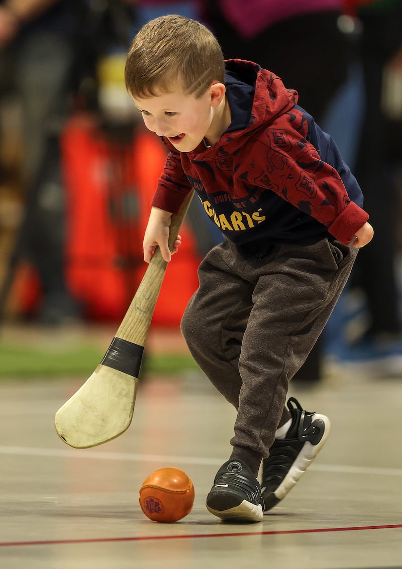 Charlie Wilkinson (5) who was born with Poland syndrome plays hurling at the limb loss sports day at the Olympia Leisure Centre. PICTURE: MAL MCCANN