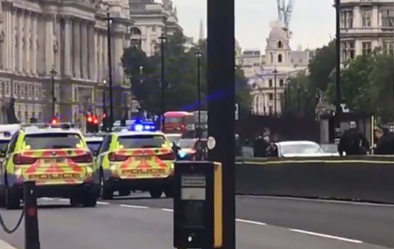 Picture taken with permission from the Twitter feed of Ewelina U Ochab of the car (right)which crashed into security barriers outside the Houses of Parliament&nbsp;