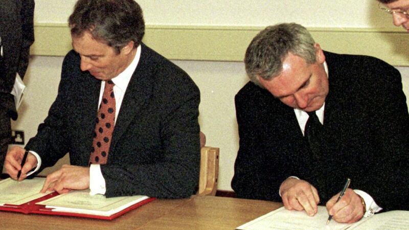 Tony Blair and Bertie Ahern sign the Good Friday Agreement in 1998. Picture by Dan Chung 