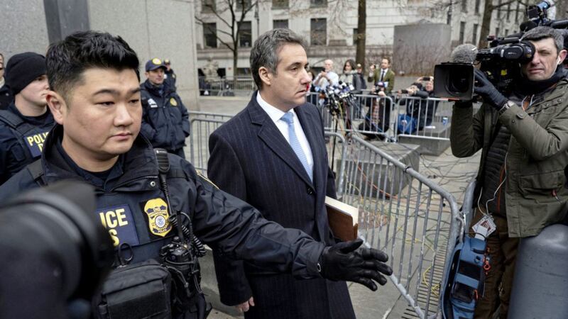 Michael Cohen leaves a federal court after his sentencing in New York 