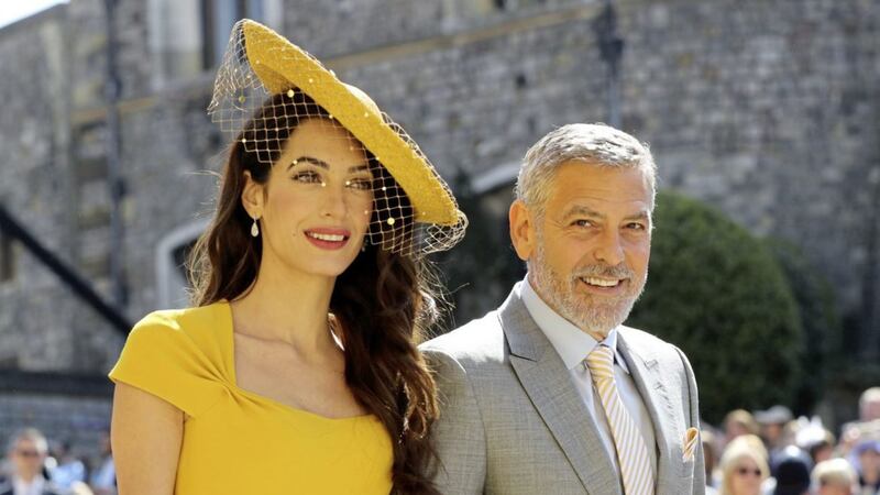 George and Amal Clooney are running a sweepstake offering a double date with them at their home in Lake Como to raise funds for the Clooney Foundation for Justice. Picture: Gareth Fuller/PA Wire 