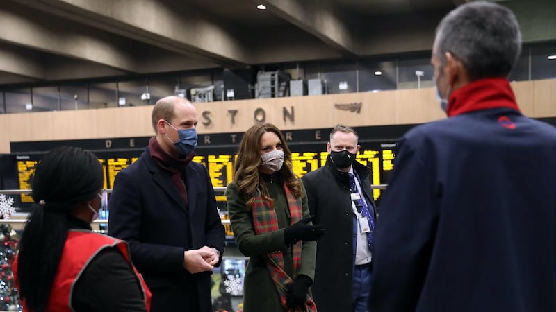 The Duke and Duchess of Cambridge praised transport workers for keeping the country moving.