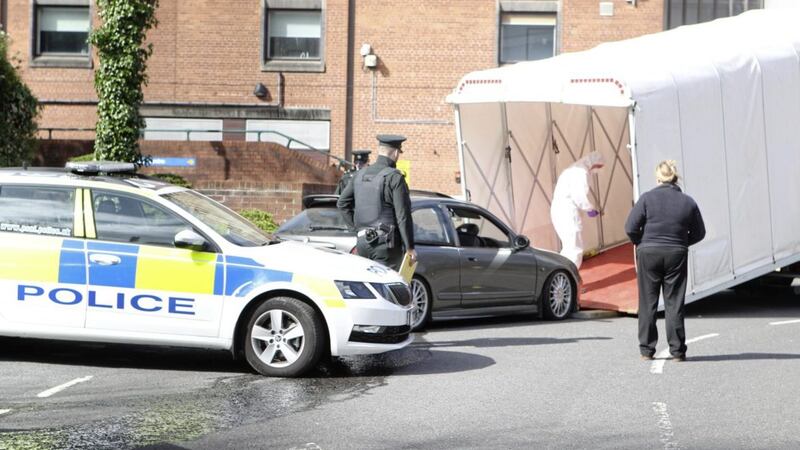 Police remove a car from the grounds of Belfast City Hospital on Sunday. Picture by Matt Bohill, Pacemaker