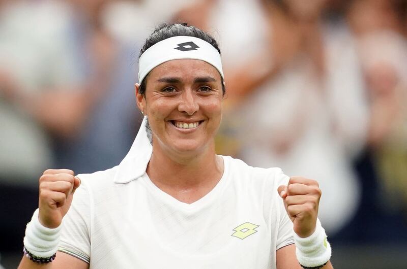 Ons Jabeur celebrates victory over Aryna Sabalenka following the ladies' singles semi-final at Wimbledon