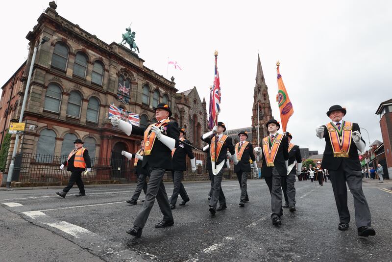 Members of the Orange Order take part in a Twelfth of July parade in Belfast in 2023