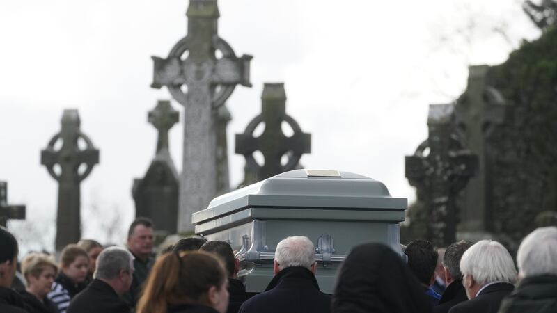 The coffin of Denise Morgan is carried out of the Church of the Assumption in Tullyallen (Brian Lawless/PA)