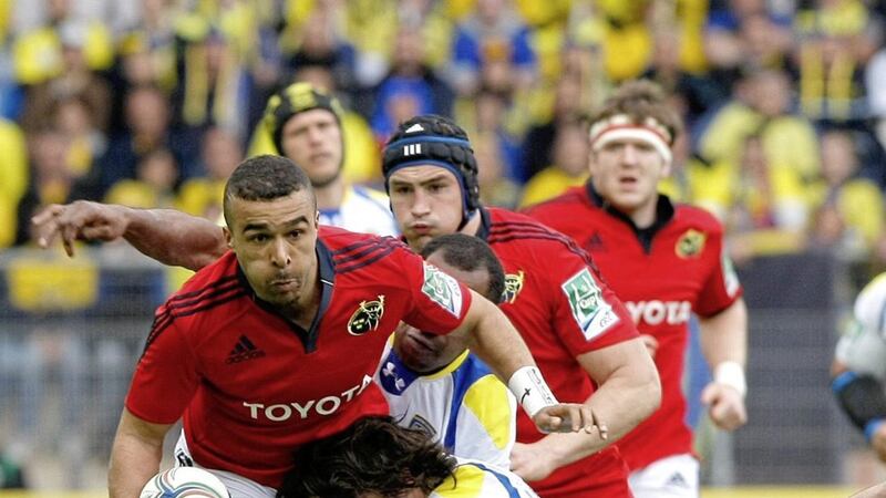 Munster&#39;s Wing Simon Zebo, left, is tackled by Clermont Ferrand&#39;s Julien Bardy, during their Heineken Cup semi final rugby union match, at the Mosson Stadium, in Montpellier, southern France, Saturday, April 27, 2013 