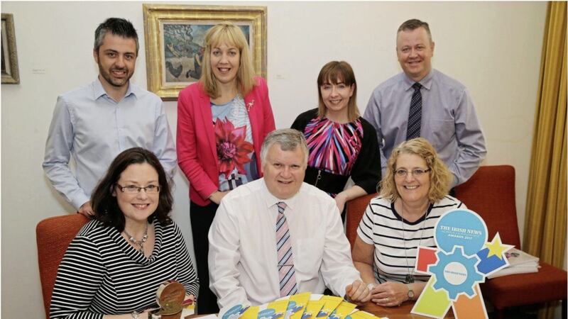 Irish News business editor Gary McDonald (judging panel chairman, seated centre) with fellow judges Orlagh O&#39;Neill (Carson McDowell) and Dolores Vischer (Queen&#39;s University), both seated. At back (from left) are Brian Byers (Ulster University), Nicola Wilson (Armagh Banbridge &amp; Craigavon Borough Council), Olga Pollock (Phoenix Natural Gas) and Cathal Geoghegan (Mount Charles). Picture: Hugh Russell 