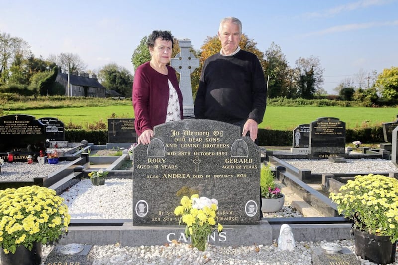 Eamon and Shelia Cairns at the graves of their murdered sons Gerard and Rory. Picture by Mal McCann. 