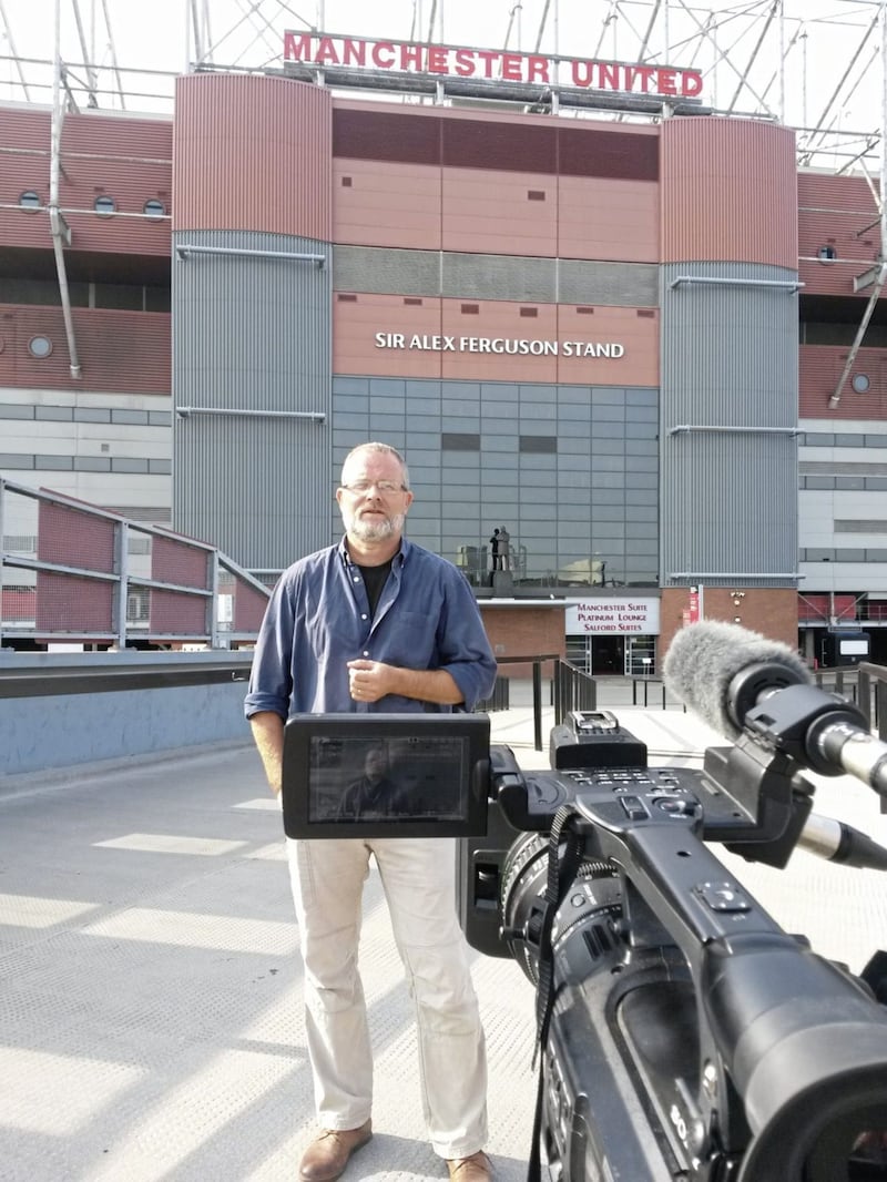Director Michael Anderesen filming outside Old Trafford 