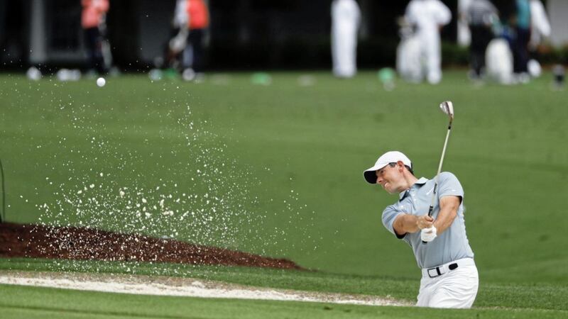Rory McIlroy practices on the driving range as he stepped up his Augusta preparation 