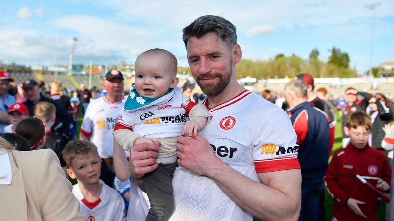 Tyrone’s Mattie Donnelly celebrates with his son Senan after the Ulster Quarter final. Picture: Mark Marlow